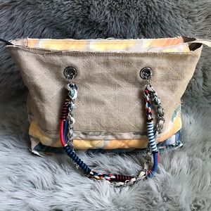 Canvas shoulder bag with unique handles